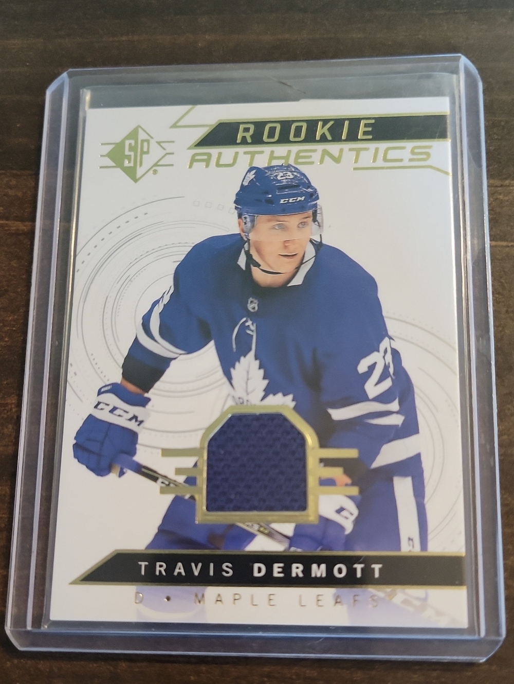 Rookie Patch Travis Dermott - Toronto Maple Leafs Blue Jersey Card
